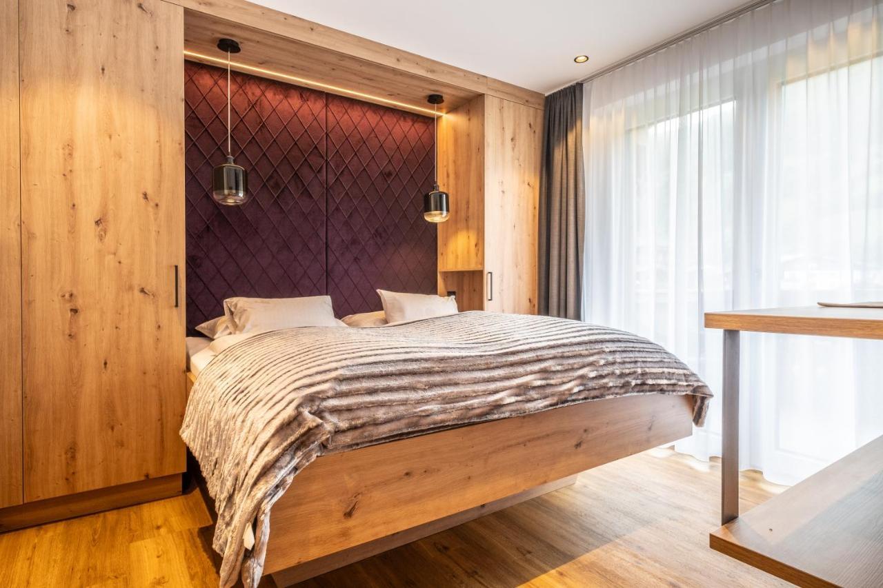 Dorfkrug Kaprun - Luxury Suites & Appartements Экстерьер фото