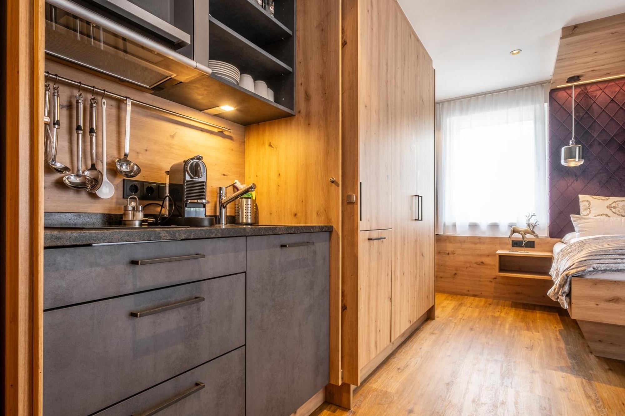 Dorfkrug Kaprun - Luxury Suites & Appartements Экстерьер фото