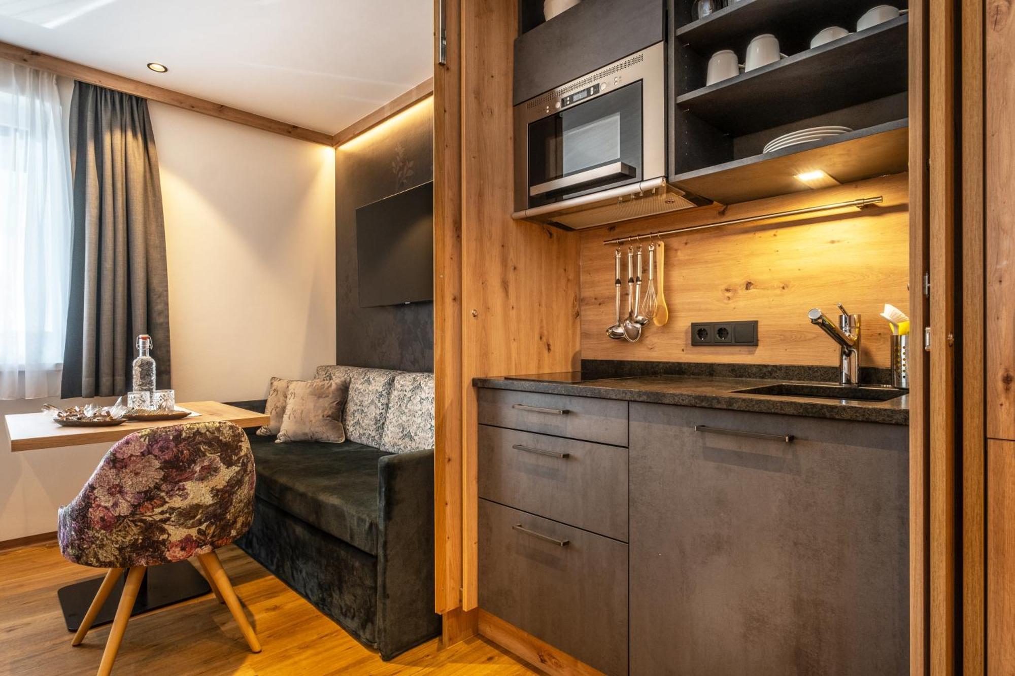 Dorfkrug Kaprun - Luxury Suites & Appartements Экстерьер фото