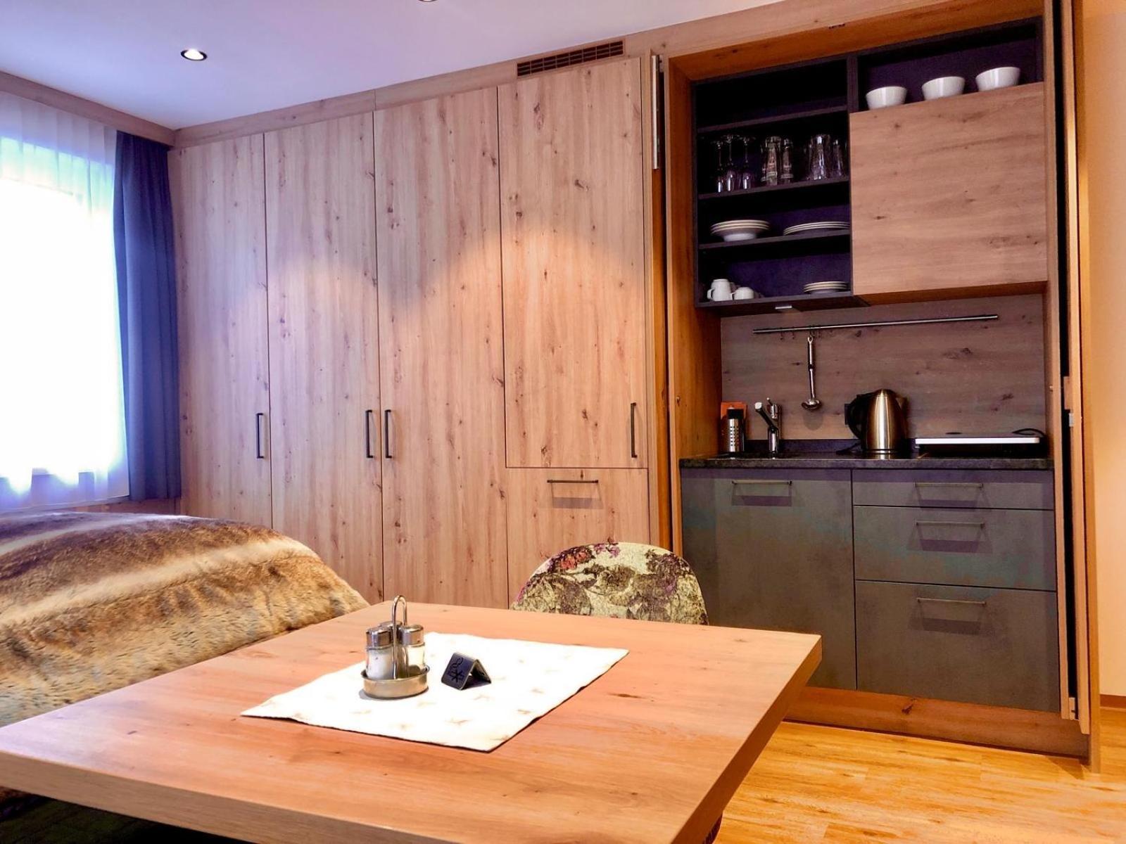 Dorfkrug Kaprun - Luxury Suites & Appartements Экстерьер фото